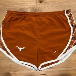 Long horns Texas. Merch Nike White and Burnt Orange Athletic Shorts